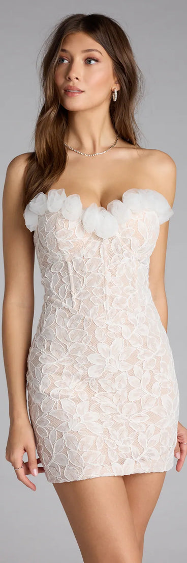 The Aria Lace Rosette Trim Corset Mini Dress is your new go-to white dress—effortless, versatile, and made to update your fall style in seconds.