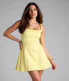 A stunning pick for an engagement photoshoot outfit or autumn wedding guest dress, this fall formal dress showcases the Selma Short A-Line Dress in yellow with a graceful silhouette that captures the moment.