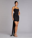 The Toni Glitter Open Back Bow Mini Dress is your new go-to Windsor dress—effortless, versatile, and made to update your fall style in seconds.