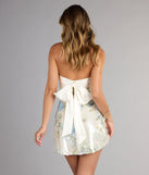 Style your seasonal looks with the Magnolia Floral Sequin Bow Back Mini Dress, a trend-right, fall dress designed for any plan on your calendar with new and unqiue details.