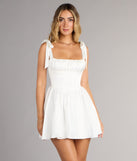 Style your seasonal looks with the Elida Lace-Up Skater Satin Short Dress, a trend-right, fall dress designed for any plan on your calendar with new and unqiue details.