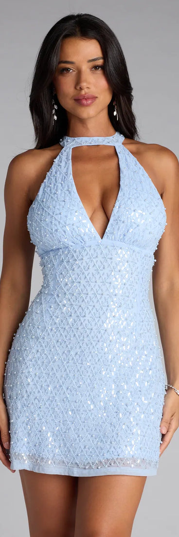 The Anna Halter A-Line Beaded Mini Dress is your new go-to light blue dress—effortless, versatile, and made to update your fall style in seconds.