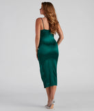 Revamp your 2025 wardrobe with this chic addition, the Natalia Cowl Neck Satin Dress in hunter green, perfect for elevating your style in the new year.