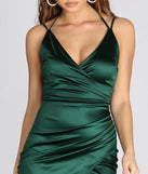 Revamp your 2025 wardrobe with this chic addition, the Amanda Wrap Satin Dress in hunter green, perfect for elevating your style in the new year.