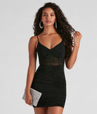 Turn heads at Prom 2025 in this black prom dress, where statement-making details meet the iconic style of the Kerrie Heatstone V-Neck Party Dress .