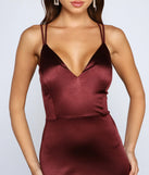 Make a statement in the Madeline Satin Bodycon Mini Dress in burgundy, a bold red prom dress designed to exude confidence, elegance, and a striking prom-night look.