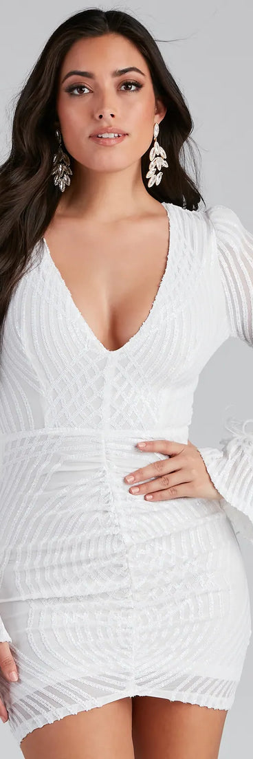 Turn heads in the beaming Paola Feather Trim Sequin Bodycon Dress, a stunning white sequin dress designed to add sparkle and elegance to your next night out or special occasion.