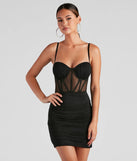 Step into seasonal chic with the Andi Heat Stone Corset Dress, a black mini dress featuring an above-the-knee cut ideal for cocktail parties, festive gatherings, or clubwear.