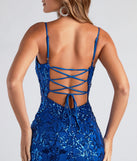 Step into the Prom 2025 dance in the Leila Sequin Bodycon Mini Dress in royal, a stunning blue prom dress designed to complement any theme with its timeless allure and statement-making style.