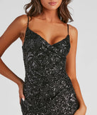 Revamp your 2025 wardrobe with this chic addition, the Cleo Sequin Wrap Mini Dress in black, perfect for elevating your style in the new year.