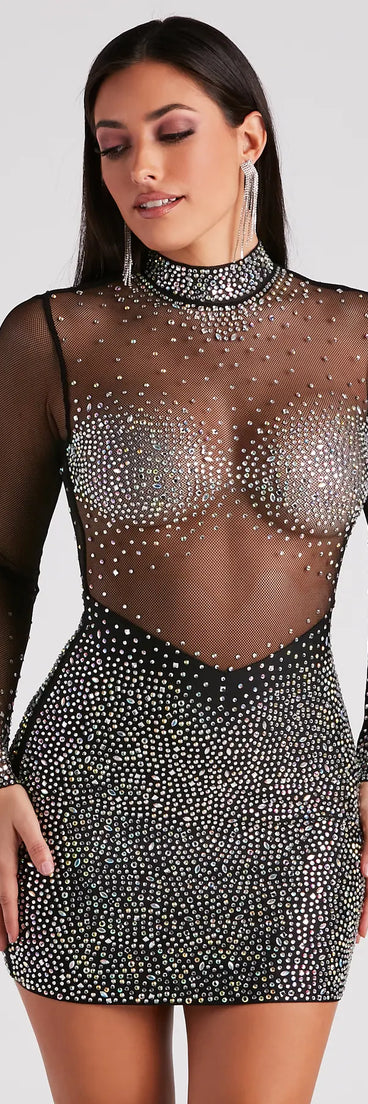 Step into winter chic with the Tate Rhinestone Mesh Party Dress, a black mini dress featuring an above-the-knee cut ideal for cocktail parties, festive gatherings, or clubwear.
