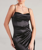The Margaret Formal Satin Wrap Midi Dress is a black midi dress, featuring an elevated midi-length silhouette perfect for wedding guest attire, romantic date nights, or effortless everyday styling.