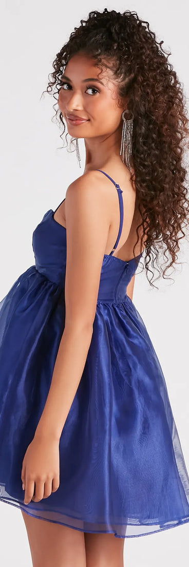 The Harlow Square Neck Babydoll Party Dress is a mini dress in navy, perfect for an above-the-knee holiday party dress or a stylish NYE look, with a short hemline designed to make a winter statement.