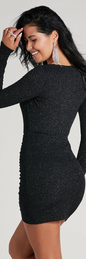 Feel instantly put-together in the Toni Glitter Cowl Neck Mini Dress in black, a fall wedding guest dress designed for confident style and all-out celebration.