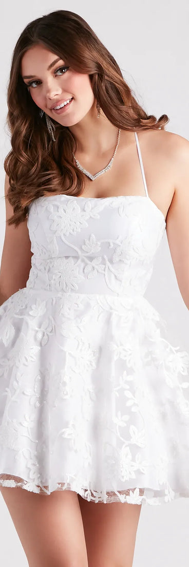 Turn heads in the beaming Joanna Sequin Lace Party Dress, a stunning white sequin dress designed to add sparkle and elegance to your next night out or special occasion.