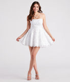 The Joanna Sequin Lace Party Dress is a dazzling white sequin dress, perfect for making a bold entrance at any event, from cocktail parties to formal celebrations.