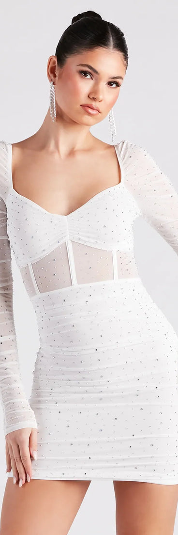 Step into seasonal chic with the Kendall Rhinestone Sheer Bodycon Mini Dress, a white mini dress featuring an above-the-knee cut ideal for cocktail parties, festive gatherings, or clubwear.