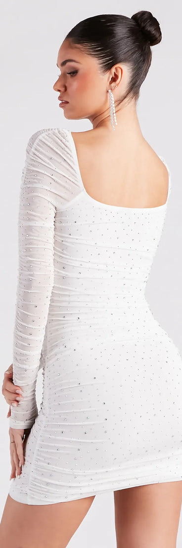 Own every entrance in the Kendall Rhinestone Sheer Bodycon Mini Dress, a white party dress perfect for milestone birthdays and grad parties, or dancing through summer nights and unforgettable bachelorette celebrations.