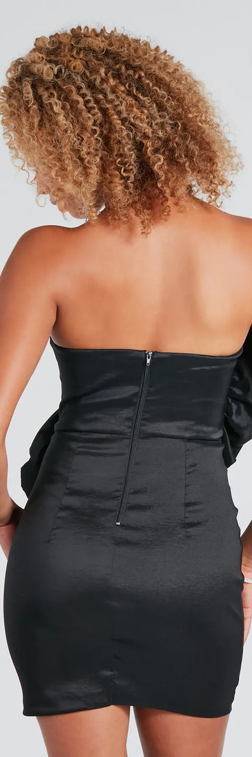 The Sophia Formal Rose Applique Mini Dress is a mini dress in black, perfect for an above-the-knee holiday party dress or a stylish NYE look, with a short hemline designed to make a winter statement.