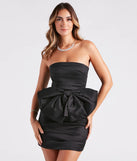 Turn heads at Prom 2025 in this black prom dress, where statement-making details meet the iconic style of the Cecilia Taffeta Bow Mini Party Dress .