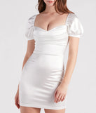 You'll look stunning in the Lexie Rhinestone Satin Puff Sleeve Bodycon Mini Dress, a white formal dress designed to create an effortless yet standout look as women's formal holiday attire, work party outfit, or NYE dress.
