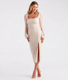 Turn heads at Prom 2025 in this ivory prom dress, where statement-making details meet the iconic style of the Skylar Formal Glitter Long Sleeve Midi Dress .