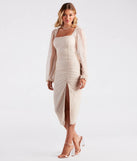 Make a bold statement in the Skylar Formal Glitter Long Sleeve Midi Dress in ivory, the perfect fall dress for weddings, cocktail hours, nights out, and/or seasonal celebrations.