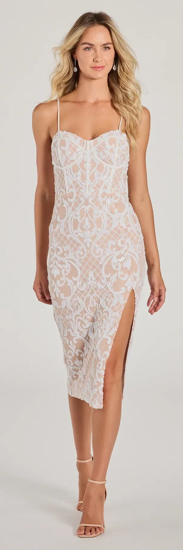 Turn heads at Prom 2025 in this white prom dress, where statement-making details meet the iconic style of the Krissy Formal Sequin Scroll Corset Midi Dress .