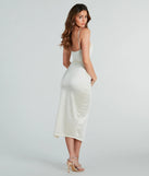 Make a bold statement in the Seona Formal Satin Midi Dress in ivory, the perfect spring dress for weddings, cocktail hours, nights out, and/or seasonal celebrations.
