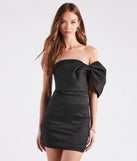 Step into winter chic with the Raeya Taffeta Bow Strapless Mini Dress, a black mini dress featuring an above-the-knee cut ideal for cocktail parties, festive gatherings, or clubwear.