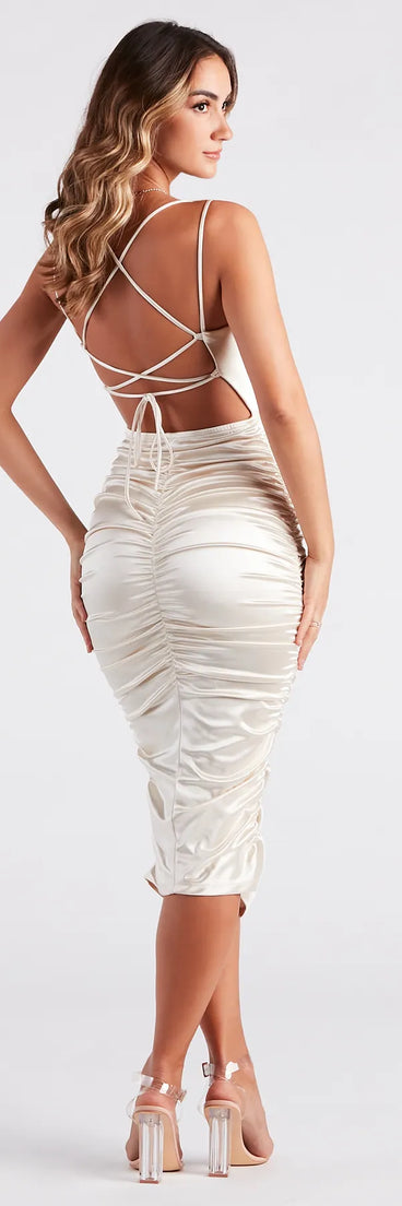 The Ivette Formal Satin Lace-Up Midi Dress is an elegant gold formal dress in a rich seasonal color and with unique design accents that make dressing up for winter parties, holiday balls, or festive gatherings effortless!