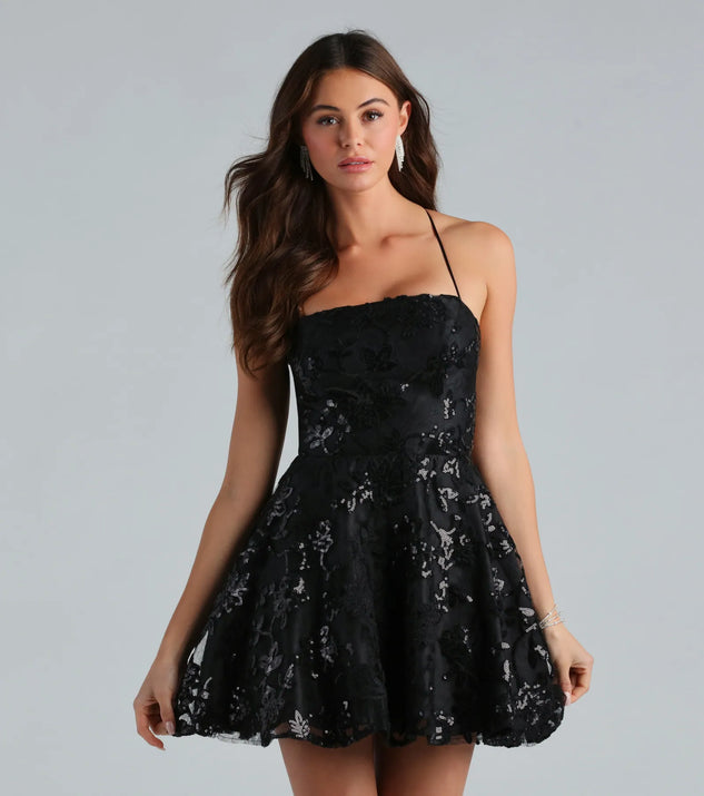 Keep it classic with the Joanna Sequin Lace Party Dress, a feed-worthy pick from Windsor's black homecoming dress collection made to stop their scroll from pictures to the dance floor.
