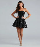 The Joanna Sequin Lace Party Dress is a dazzling black sequin dress, perfect for making a bold entrance at any event, from cocktail parties to formal celebrations.