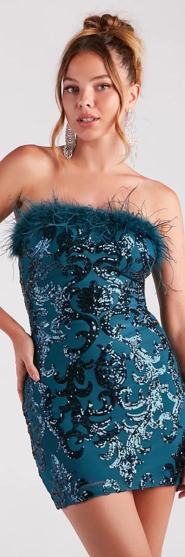 Turn heads in the beaming Neriah Sequin Marabou Feather Party Dress, a stunning teal sequin dress designed to add sparkle and elegance to your next night out or special occasion.