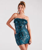 Turn heads in the beaming Neriah Sequin Marabou Feather Party Dress, a stunning teal sequin dress designed to add sparkle and elegance to your next night out or special occasion.