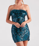 Make a bold statement in the Neriah Sequin Marabou Feather Party Dress in teal, the perfect green dress for weddings, cocktail hours, nights out, and/or seasonal celebrations.