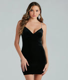Step into seasonal chic with the Monroe Rhinestone Strap Velvet Formal Mini Dress, a black mini dress featuring an above-the-knee cut ideal for cocktail parties, festive gatherings, or clubwear.