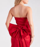 The Lucy Taffeta Bow Mini Party Dress in red brings sleek style to any graduation outfit, from cap and gown to after-party.