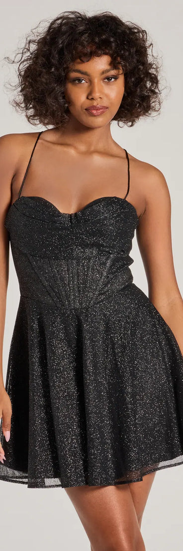 Keep it classic with the Leah Glitter Mesh Corset Skater Dress, a feed-worthy pick from Windsor's black homecoming dress collection made to stop their scroll from pictures to the dance floor.