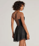 Own every entrance in the Leah Glitter Mesh Corset Skater Dress, a black party dress perfect for milestone birthdays and grad parties, or dancing through summer nights and unforgettable bachelorette celebrations.