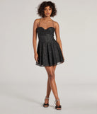 Make a bold statement in the Leah Glitter Mesh Corset Skater Dress in black, the perfect summer dress for weddings, cocktail hours, nights out, and/or seasonal celebrations.