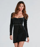 Step into seasonal chic with the Raquel Formal Rhinestone Velvet Mini Dress, a black mini dress featuring an above-the-knee cut ideal for cocktail parties, festive gatherings, or clubwear.