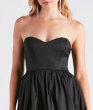 Revamp your 2025 wardrobe with this chic addition, the Colleen Taffeta Strapless Bubble Hem Dress in black, perfect for elevating your style in the new year.