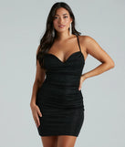 Step into winter chic with the Rita Glitter Strappy Back Party Dress, a black mini dress featuring an above-the-knee cut ideal for cocktail parties, festive gatherings, or clubwear.
