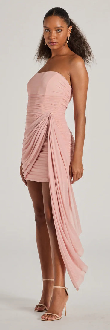 Bring a fun and feminine vibe with the Kaiya Strapless Bodycon Ruched Mesh Mini Dress in blush, a scroll-stopping style from Windsor's pink homecoming dress collection that brings playful charm to every HOCO moment.