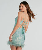 Revamp your 2025 wardrobe with this chic addition, the Angie Feather Trim Sequin Formal Mini Dress in sage green, perfect for elevating your style in the new year.
