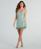 The Angie Feather Trim Sequin Formal Mini Dress is a dazzling black sequin dress, perfect for making a bold entrance at any event, from cocktail parties to formal celebrations.