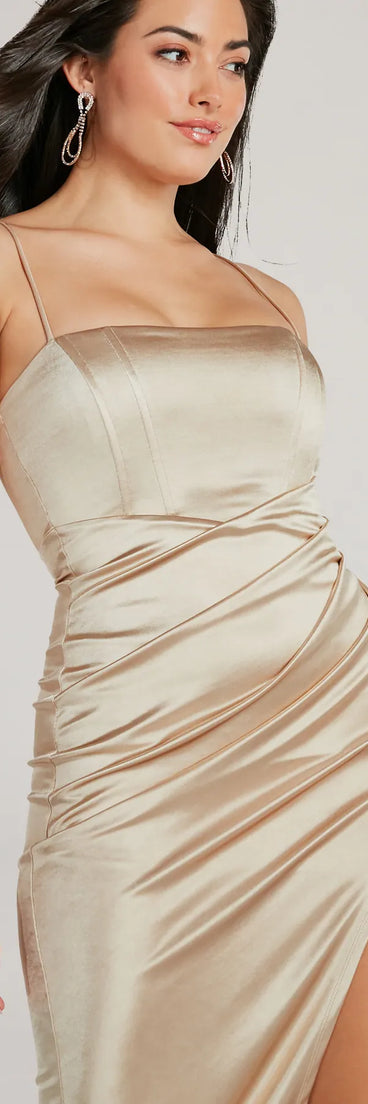 With its mid-calf hem and popular flattering fit, the Harriet Formal Satin Corset Midi Dress in gold nails the balance of trend and ease, redefining go-to midi dresses for any occasion.