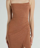Make a bold statement in the Joelle Wrap-Front Glitter Knit Formal Midi Dress in copper, the perfect spring dress for weddings, cocktail hours, nights out, and/or seasonal celebrations.