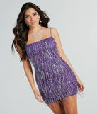 Turn heads in the beaming Khloe Sequin Fringe Party Dress, a stunning purple sequin dress designed to add sparkle and elegance to your next night out or special occasion.